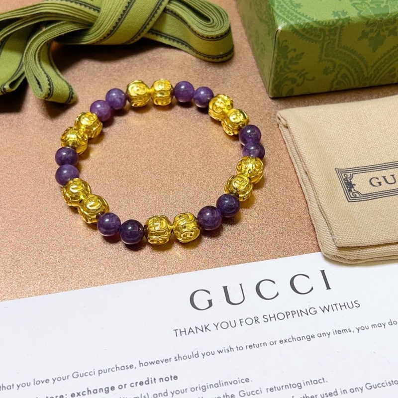 G*u*i bracelets